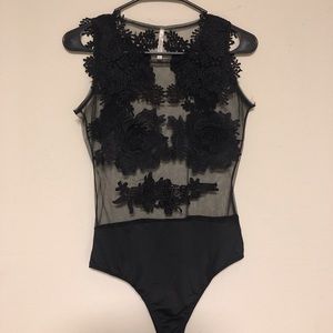 Transparent black bodysuit